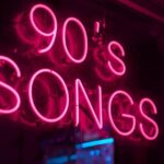 Cassette tapes and headphones with 90s retro vibe.