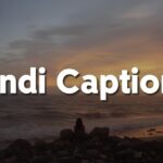 Smartphone showing Hindi captions for Instagram with emojis.